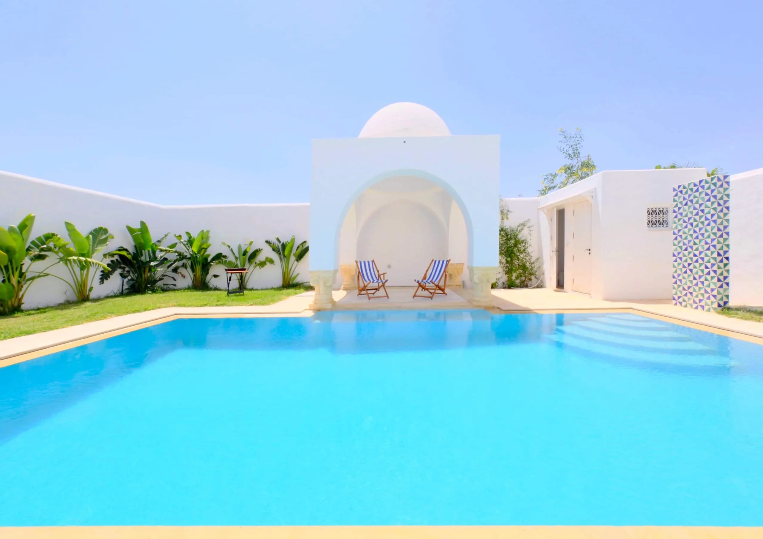 The infinity pool and domed pavilion